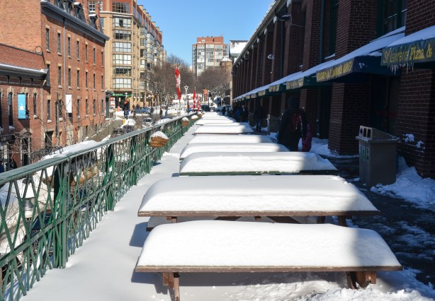 upper level outdoor eating area - picnic tables covered in snow!