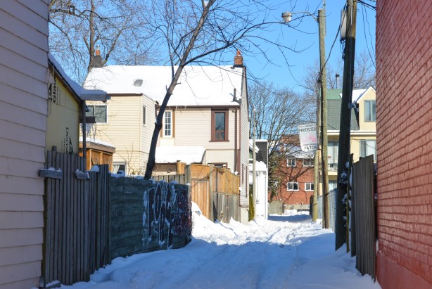 A snow covered lane running east from Munro St., just north of Dundas East.