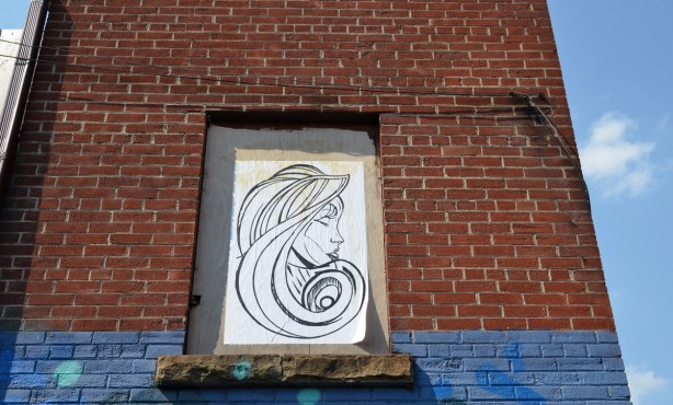 Looking out over the alley.