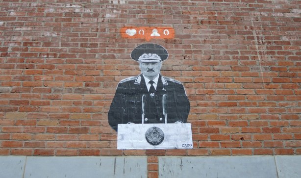 larger than life black and white picture with the instagram heart symbol on orange background for number of likes for that picture