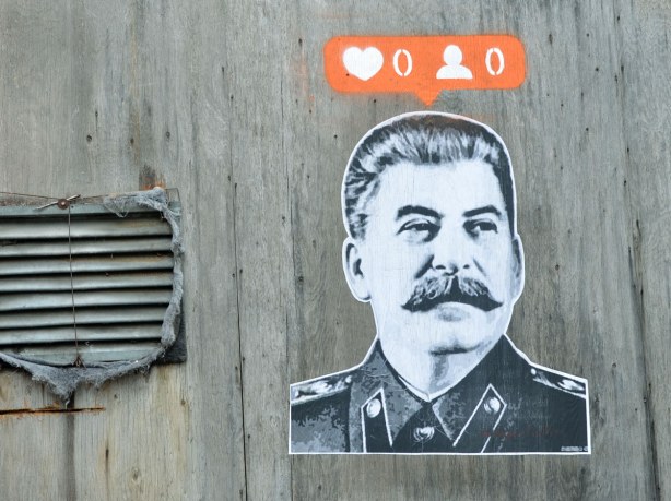 larger than life black and white picture with the instagram heart symbol on orange background for number of likes for that picture