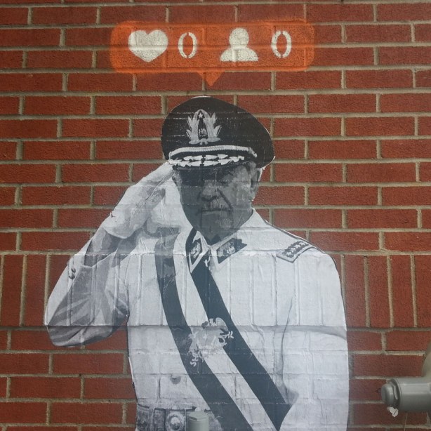 larger than life black and white picture with the instagram heart symbol on orange background for number of likes for that picture