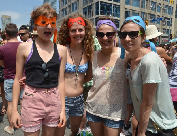 four girls, each with a different coloured mask, like the ninja turtles TV characters wear.