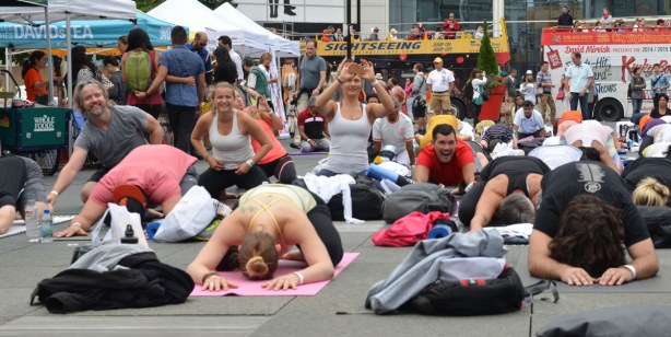 Group of people at 2014 yogathon, Dundas Square