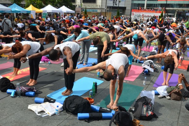Group of people at 2014 yogathon, Dundas Square