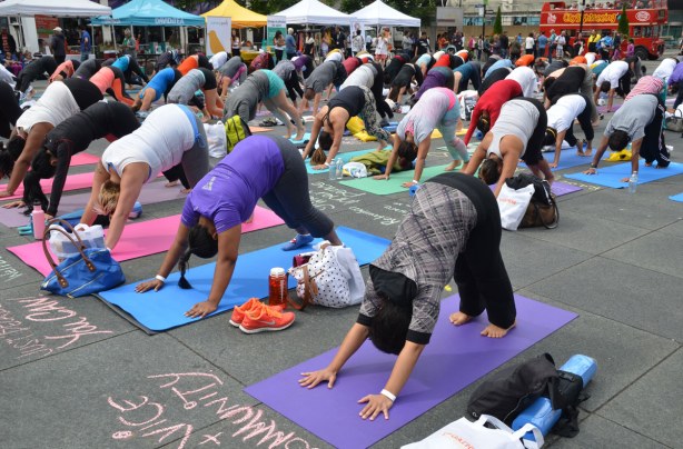 Group of people at 2014 yogathon, Dundas Square