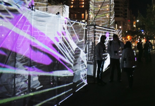the amazing maze, made from a frame of metal bars wrapped in transparent gauze like fabric.  Coloured lights shine through the maze and the colours change frequently, purples, blues, yellows and reds.