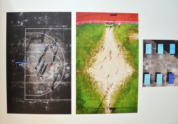 These pictures were taken from drones that were flying over playing fields.  The shadows of the players look like they are the people. 