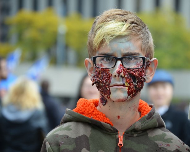 zombie boy who is staring straight ahead