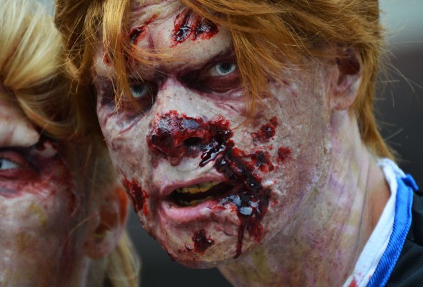 zombie from Toronto zombie walk - auburn wig and very bloody face, man