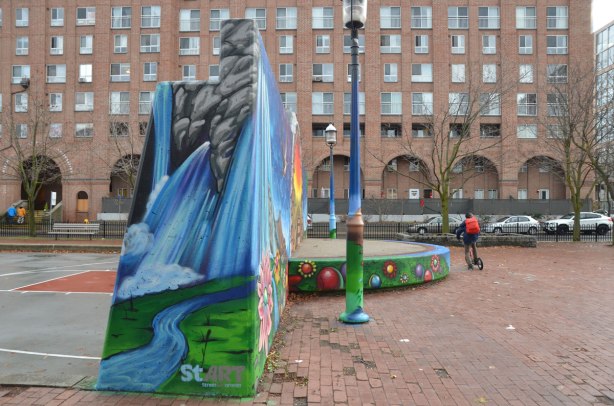 mural on the back wall of a basketball court