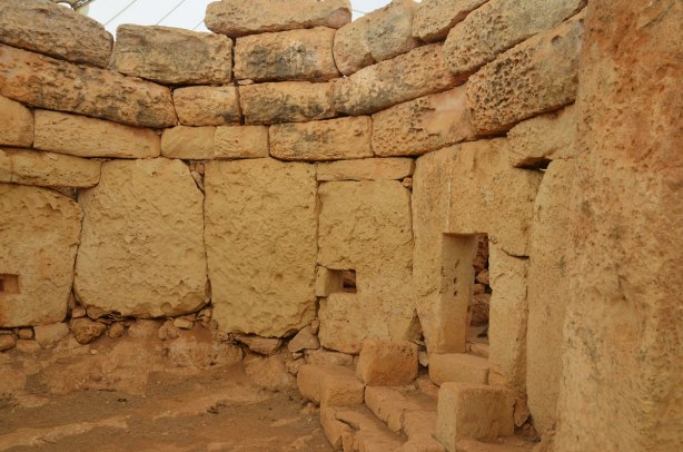 curved walls of a megalithic prehhistoric limestone site in Malta