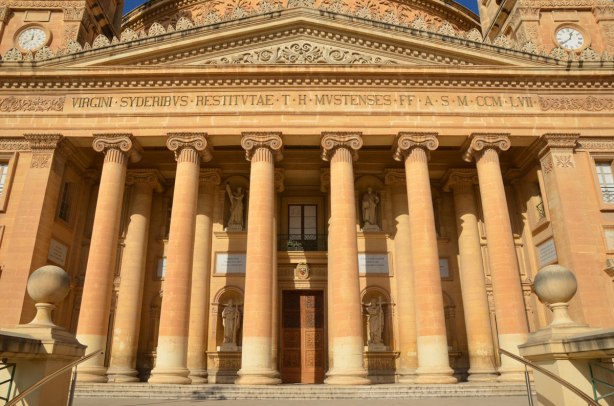 front entranceway of the cathedral with its 12 tall ionic columns and triangular cornice above the columns.