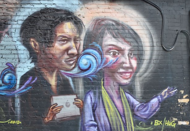 Graffiti picture of two people, a man and a woman,