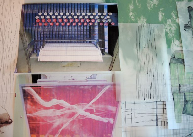 close up of part of a large collage art piece on a wall.  One of the pictures is of a typewriter