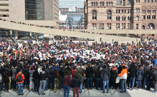 crowds of people at Nathan Phillips square on a spring Saturday afternoon