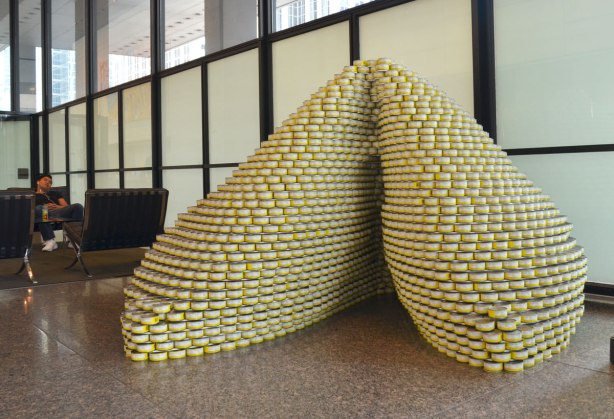 sculptures on display that were entered in a contest in support of the Daily Food Bank, sculptures made of canned food in a theme pertaining to hunger awareness - a large fortune cookie made of 9000 cans of tuna