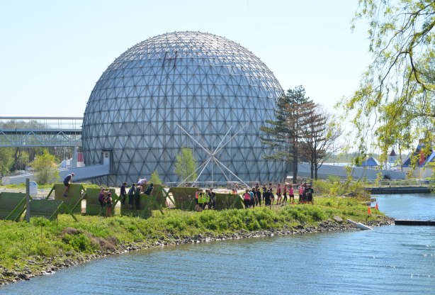 Ontario Place cinesphere, the dome, with an obstacle course being run in front of it 