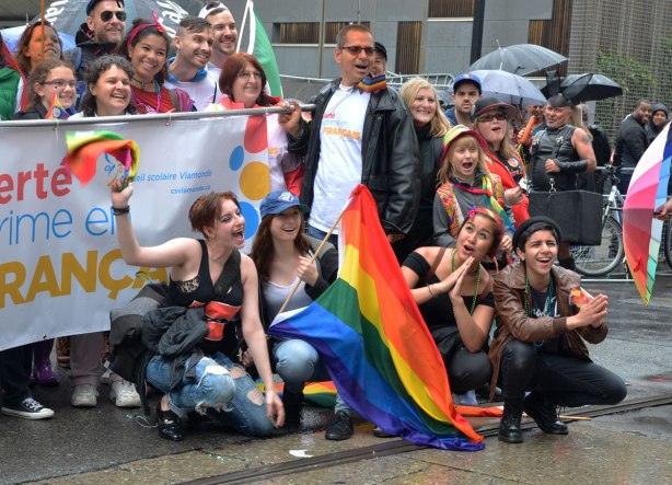 part of a group photo taken after the pride parade.  Group is Conseil scolaire viamonde, le success s'exprime en francais, an association of French schools in Ontario