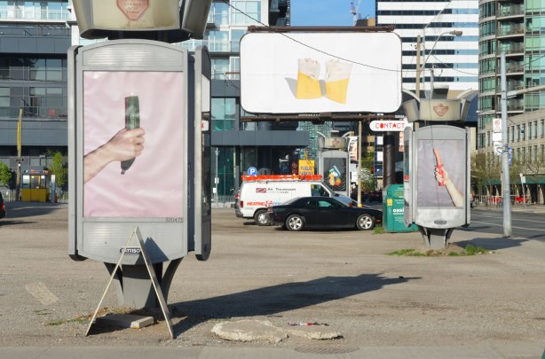 three billboards with art images instead of advertisements