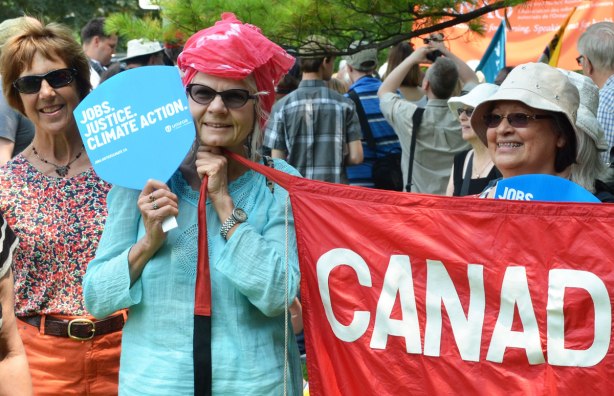 Three women at a protest rally. 