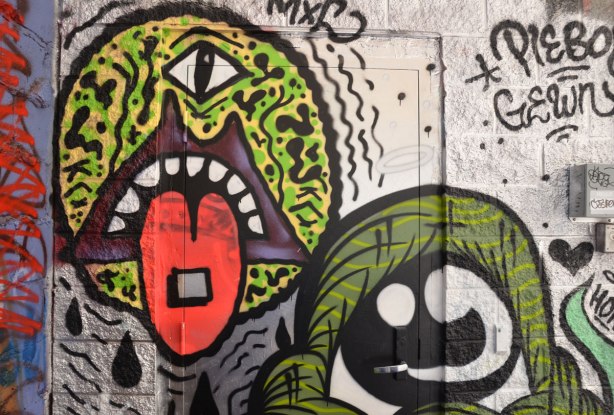 pieboy graffiti, large green one eyed monster