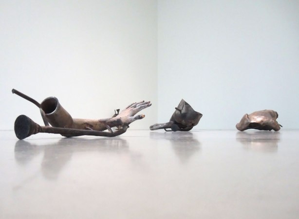 Three of the metal pieces from Gustave's WIng, an art installation by Danh Vo, pieces of body cast in metal