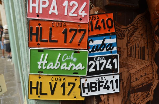 picture taken in the old part of the city of Havana Cuba - colourful licence plates for sale in a shop for tourists