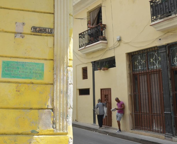 picture taken in the old part of the city of Havana Cuba - yellow buildings on calle trejadillo 