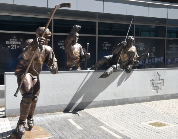 Three of the bronze statues of hockey players outside the ACC, Legends Row. Matt Sundin, Borje Salming and Darryl Sittler are in the picture, or at least their statues are. 