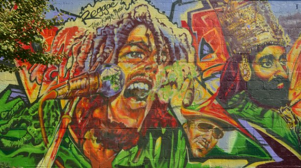 Part of a very colourful mural depicting various reggae musicians - 