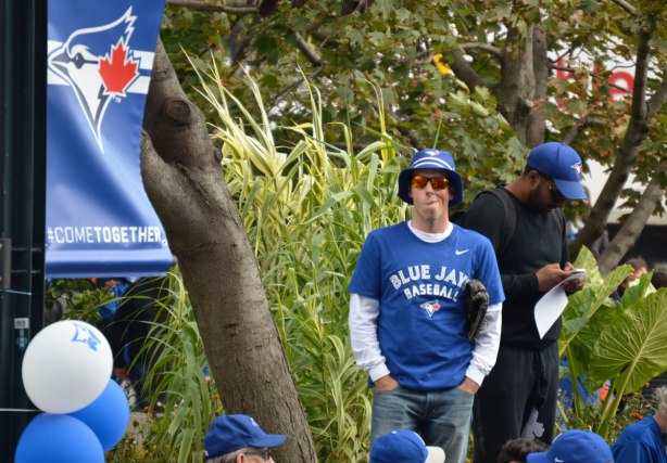 Before a Blue Jays baseball game at the ROgers Centre - a man watches over the crowd 