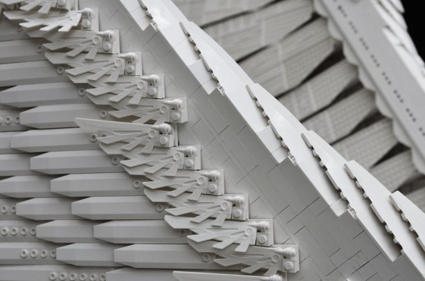 close up of the wings and the lego blocks used to make the sculpture of a barn owl 