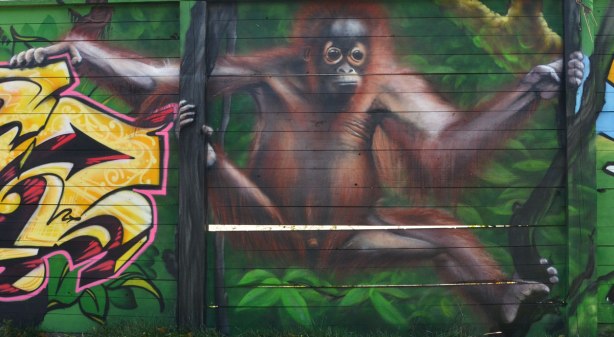 street art painting of a brown monkey
