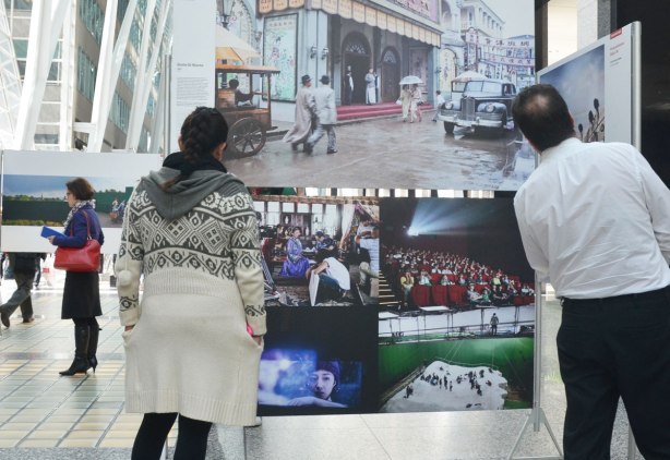 people looking at photographs, the winning pictures from the World Press Photo contest, on display at Brookfield Place 