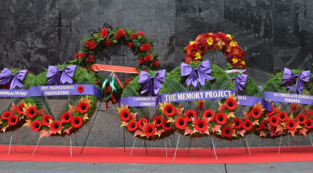 wreaths in front of the granite wall of the Ontario Veterans Memorial