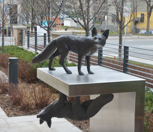 part of an art installation by Eldon Garnet called inversion - two foxes, one on top of the other on a metal platform. The bottom one is upside down