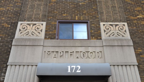stonework over the door of the Maplewood apartments at 172 Vaughan road, and the art deco like decorations beside it. 
