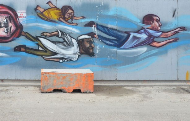 flying people mural by elicser