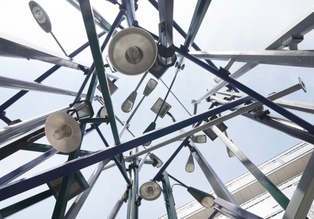 looking up at the lights from underneath the artwork,Lampposts by Tadashi Kawabata