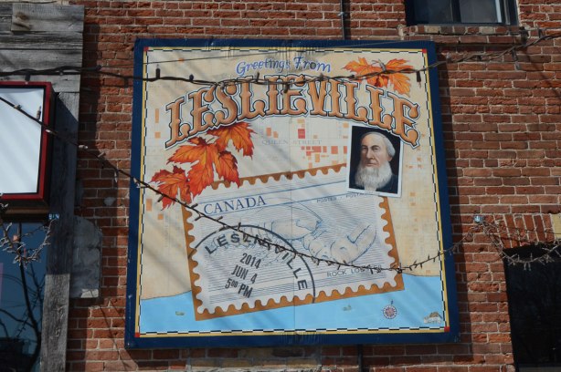 One of the Leslieville murals. Greetings from Leslieville with a postcard on it.