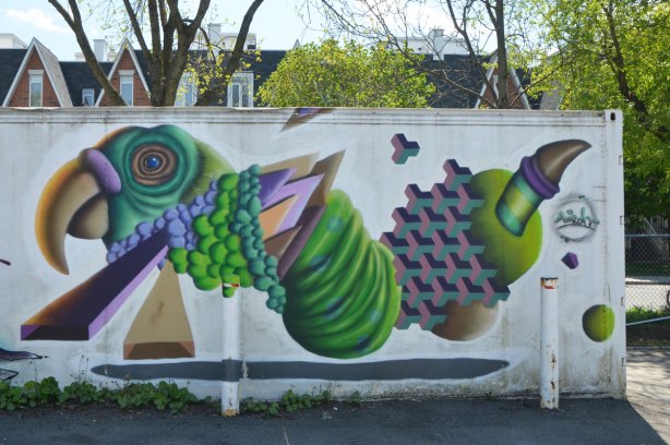 street art mural on a garage door in an alley by birdo - a creature with a green and purple body and head that looks like a parrot