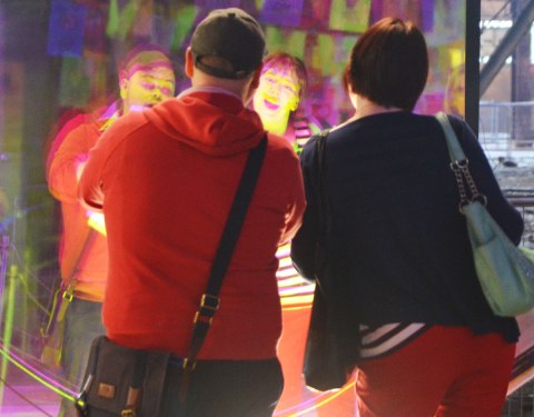 people interacting with an anaglyphic mirror at the 10th luminato festival, hearn generating station
