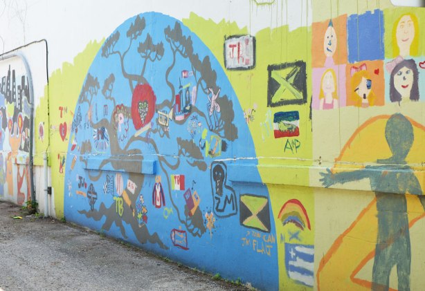 Part of a mural in an alley painted by students from Gledhill Public school, graduating class of 2010. A blue semi-circle
