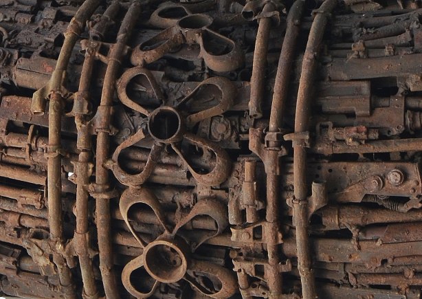close up of Naga sculpture made with parts of destroyed weapons. 