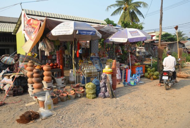 a roadside store selling clay pots 