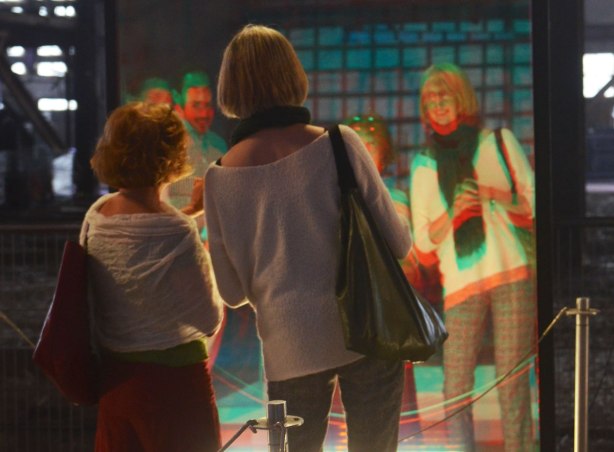 people interacting with an anaglyphic mirror at the 10th luminato festival, hearn generating station