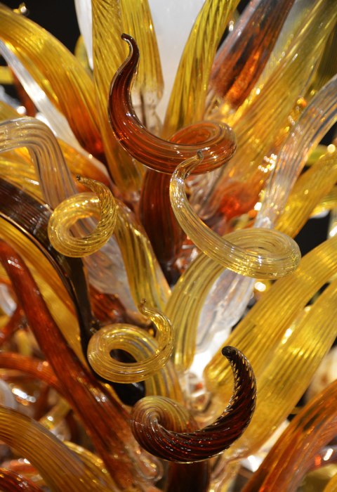 curly pieces of glass in different shade of amber, look a bit like curly seaweed growing under water