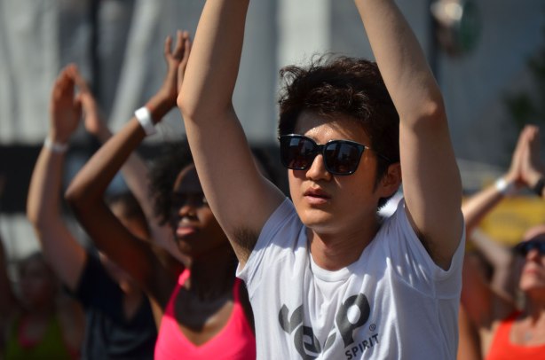 young asian man in sunglasses and white t-shirt