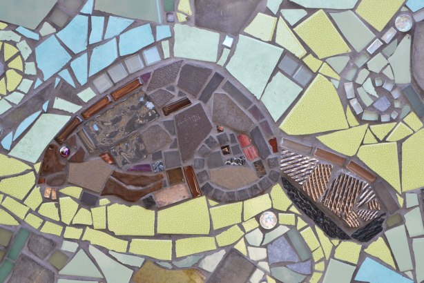 a beaver made with mosaic tiles and pieces of glass